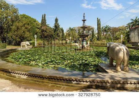 Lotus Pool And Marble Elephants In Saheliyon Ki Bari Gardens Or Courtyard Of The Maidens In Udaipur.