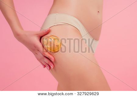 Woman In Beige Panties Massaging Thigh Massage Receiving A Professional Anti Cellulite Cans Jars, Ba