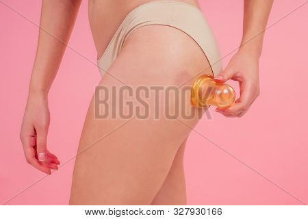 Woman In Beige Panties Massaging Thigh Massage Receiving A Professional Anti Cellulite Cans Jars, Ba