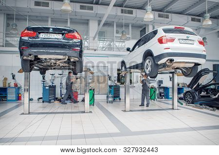 Car Repair, Bmw Advertising, Moscow, 1.11.2018: Bmw Motor Company Badge On The Front From A Black Ca