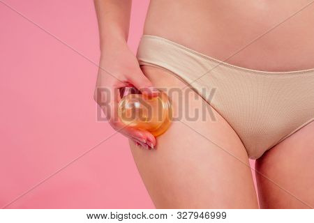 Woman In Beige Panties Massaging Thigh Massage Receiving A Professional Anti Cellulite Cans Jars, Ba