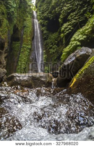 Sekumpul Waterfalls Surrounded By Tropical Forest In Bali, Indonesia.