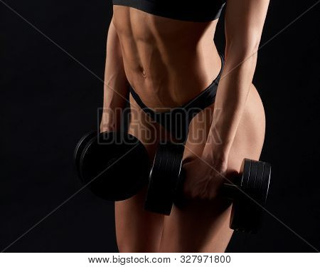 Ahletic, Sportive, Muscular Female Torso And Body Of Sexy Woman. Young Girl With Dumbbells Wearing I