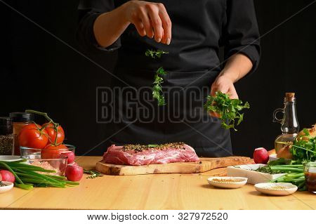 Pork Steak And Green Herbs, Italian Parsley From The Chef In The