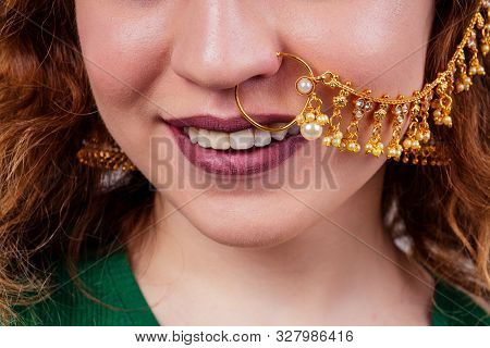 Indian Beautiful Fashion Brunette Woman In Green Traditional Sari With Gold Jewelry Set Nose Ring Pi