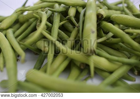 Radish Pods Heap Isolated On White Background. Fresh Organic Indian And Pakistani Vegetable Selectiv