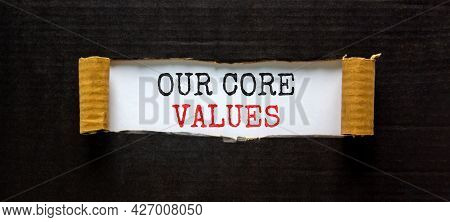 Our Core Values Symbol. Words 'our Core Values' Appearing Behind Torn Black Paper. Beautiful Black B