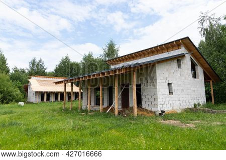 Working Process, Suburban Construction From Silicate And Gas Silicate Blocks And Wood. The Frame Of 