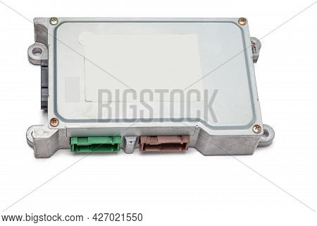 Metallic Car Engine Control Unit With Plastic Elements On A White Isolated Background Is Connecting 