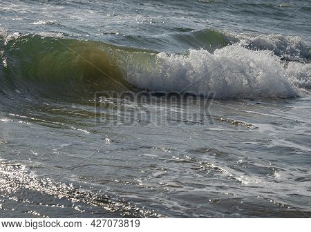 Colored Sea Waves With Splashes And White Breakers In Circeo Park, Sabaudia, Italy