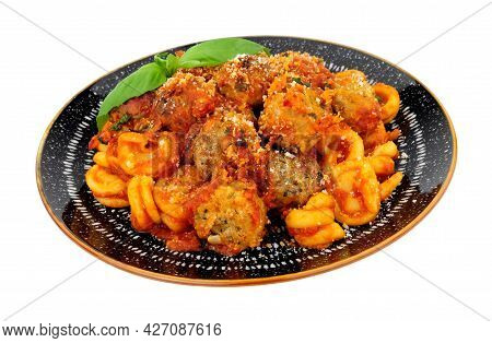 Beef And Pork Meatballs Al Forno With Trulli Pasta In Tomato Sauce Meal Isolated On A White Backgrou