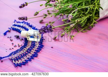 Lavender Essential Oil And Bath Salt  . Natural Cosmetics Background