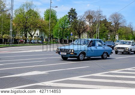 Bucharest, Romania, 24 April 2021 Old Retro Vivid Blue Romanian Dacia 1310 Classic Car In Traffic In
