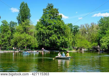 Bucharest, Romania - 9 May 2021: Vivid Green Landscape With Old Large Linden Trees And Green Leaves 