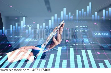 Businesswoman With Tablet In Hands Is Touching The Screen In Order To Trade Successfully. Concept Of