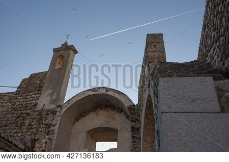 Galisteo, Beautiful Walled Town From Alagon Valley. Swifts Flying Over Puerta De La Villa. Extremadu