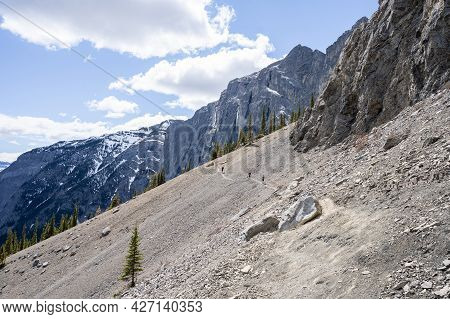 Descent On The Scree While Hiking In Canadian Rockies, Shot At Mt Yamnuska Trail, Alberta, Canada