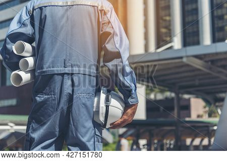 Engineer Man Hands Holding Hardhat White Work Helmet Hard Hat For Construction Engineering. Construc