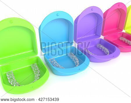 3d Render Of Clear And Removable Aligners With Cases In Row Over White Background