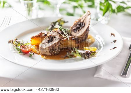 Pork Tenderloin Stuffed With Prunes, Reduction From Red Wine With Potato Gratin. Creative Festive Ma