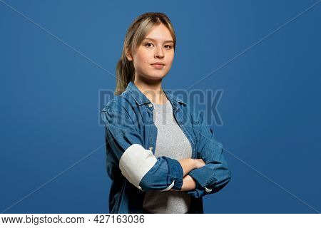 Female volunteer wearing a armband portrait