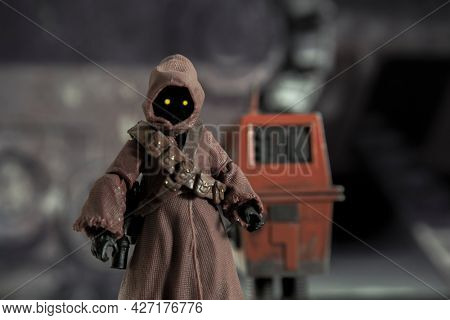 JUNE 12 2021:scene from Star Wars with Jawas on Tatooine selling droids  - Hasbro action figure