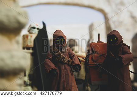 JUNE 12 2021:scene from Star Wars with Jawas on Tatooine selling droids  - Hasbro action figure