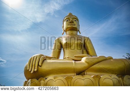 Golden Big Buddha On Phu Chang Noi  At Chiang Khan Loei Thailad.chiang Khan Is An Old Town And A Ver