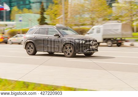 Moscow , Russia - May 2021: Black Mercedes-benz Gle Class On The City Road. Fast Moving Mercedes Gle