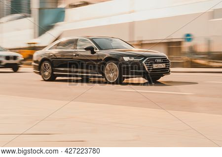 Moscow , Russia - May, 2021: Front Side View Rolling Shot With Black Audi A8l In Motion. Fourth Gene