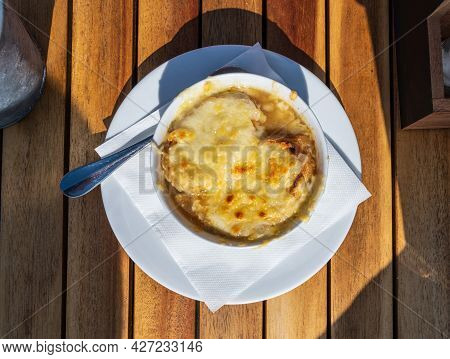 French Caramelized Onion Soup With Croutons And Gruyere Cheesse From Oven