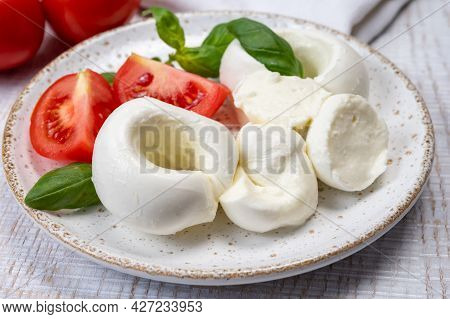 South Italian Soft White Mozzarella Cheese Made From Buffalo Cows Milk Served With Ripe Tomatoes And