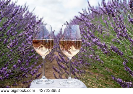Summer In French Provence, Cold Gris Rose Wine From Cotes De Provence And Colorful Lavender Fields O