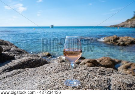 Summer Time In Provence, Glass Of Cold Rose Wine On Sandy Beach And Blue Sea Near Saint-tropez, Var