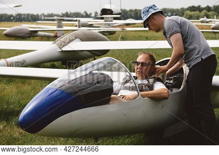 Soaring Club, Getting Ready For The Flight On Glider Airplane. Small Aviation Sport. Two Man Checkin