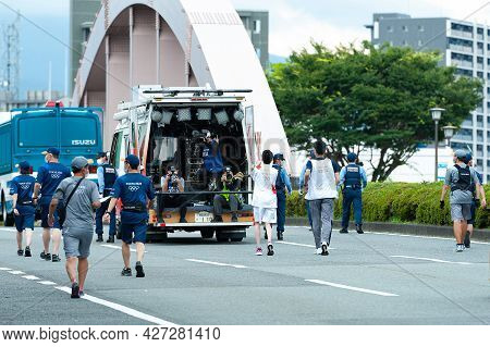 Fuji City, Shizuoka-ken, Japan - June 24, 2021: Tokyo 2020 Olympic Torch Relay In Fuji City. Team Of