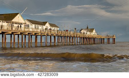 A View Of Southwold Pier At Sunset On A Cold Autumn Evening