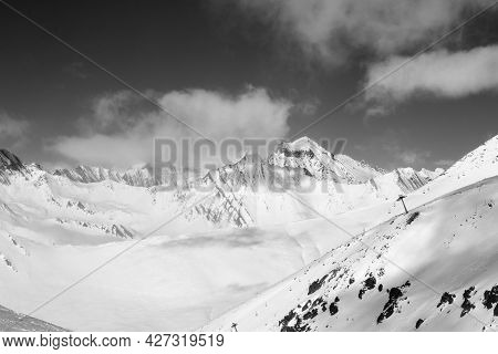 Black And White Off-piste Slope And Chair-lift On Ski Resort At Sun Day. Winter Caucasus Mountains I