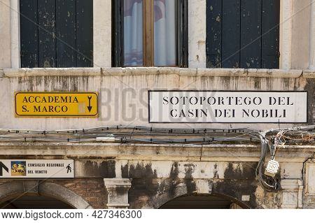 Signage  Sotoportego To Casin Dei Nobili (english: Passage To Hotel Of The Nobles) And Way To Academ