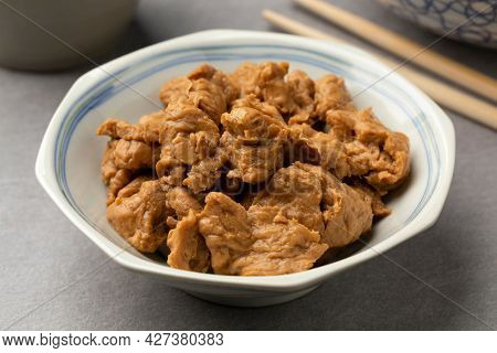 Bowl with raw Asian Seitan, wheat gluten, close up 