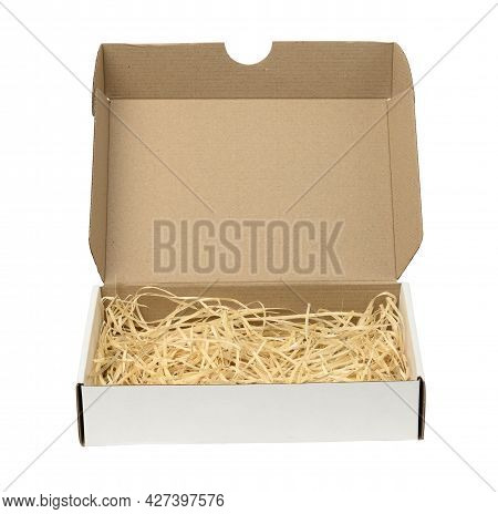 Rectangular Open Corrugated Paper Box With Sawdust Inside. Packaging, Containers For Transportation