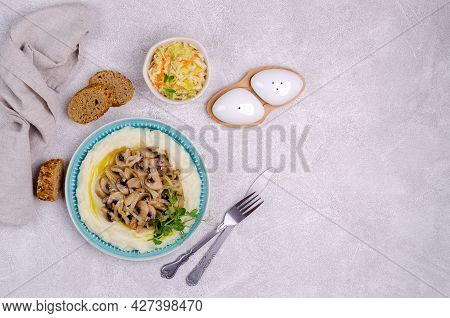 Mashed Potatoes With Butter, Fried Mushrooms With Onions And Salad Of Fresh Vegetables On A Gray Cem