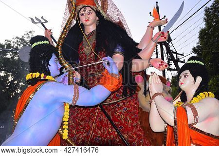 Background Durga Puja Festival And Tableau. Sculpture Of Hindu Goddess Durga