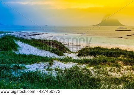 Seascape, Sea Coast With Grassy Dunes And Island Bleiksoya In The Distance, View From Kleivodden Vie