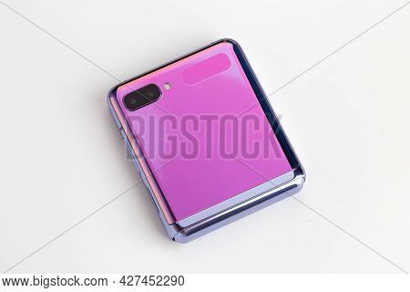 Rostov-on-don, Russia - June 2020. Samsung Galaxy Z Flip On A White Background. New Smartphone With 