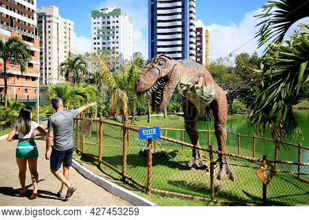 Dinosaur Sculpture In Park
