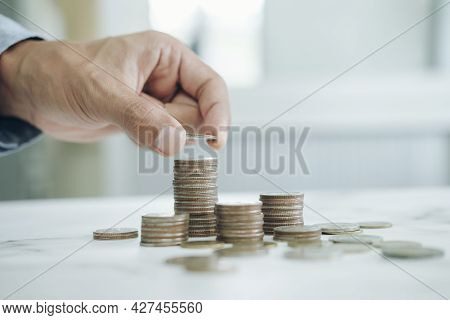 Businessman Saving Money Concept.