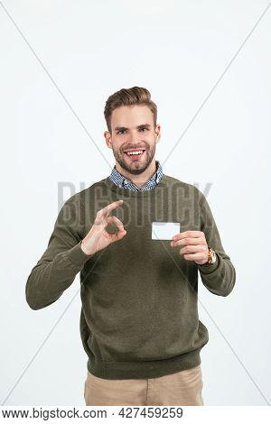 Handsome Man With Stylish Hair Showing Credit Card Isolated On White, Copy Space, Banking Online