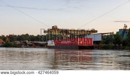Surrey, Greater Vancouver, British Columbia, Canada - July 7, 2021: Container Barge Loaded At A Mill