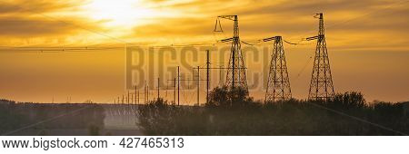 Panorama Wide Of High Voltage Power Line On Industrial Electricity Line Tower. Energy Transmisson Wi
